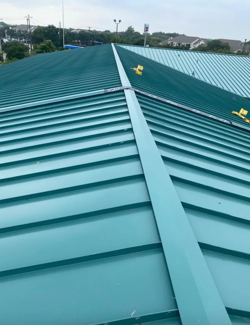Green commercial metal roof ridge and valley for Metal Roof Repair in Heber Springs